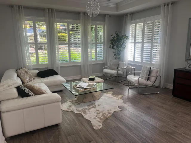 a kitchen with counter top space sink and center island