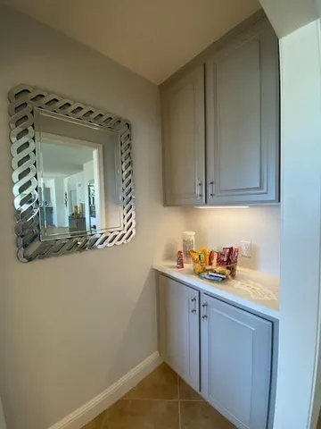 a view of a backyard with sitting area