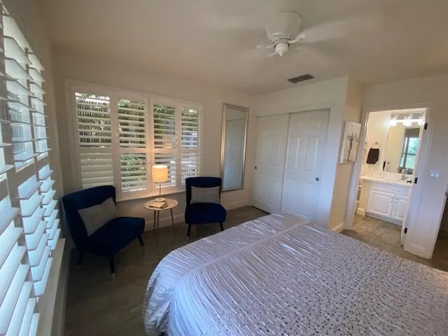 a view of a backyard and swimming pool