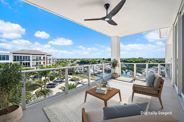 a view of a chairs and table in a patio