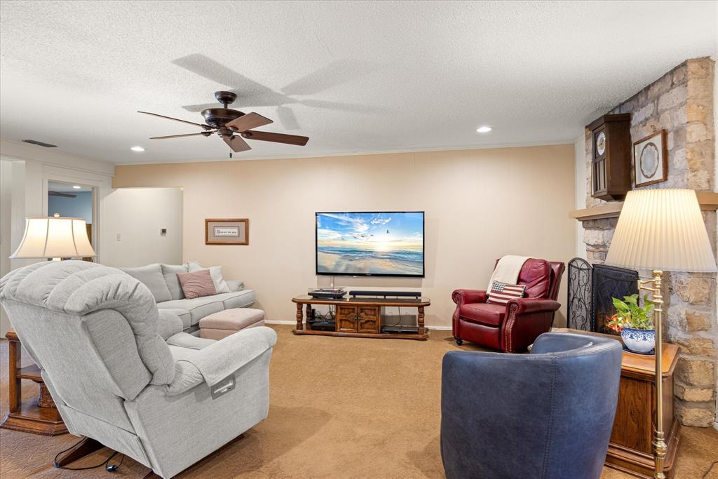 17305 Highway 281 Hico, TX 76457 - Photo 5 of 28 a living room with furniture and a flat screen tv