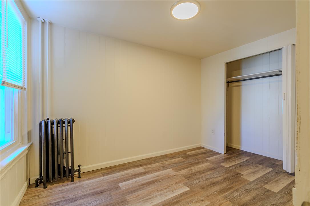 820 North 5th Street Allentown, PA 18102 - Photo 28 of 39 Newly finished floors and a spacious closet create an inviting bedroom retreat.