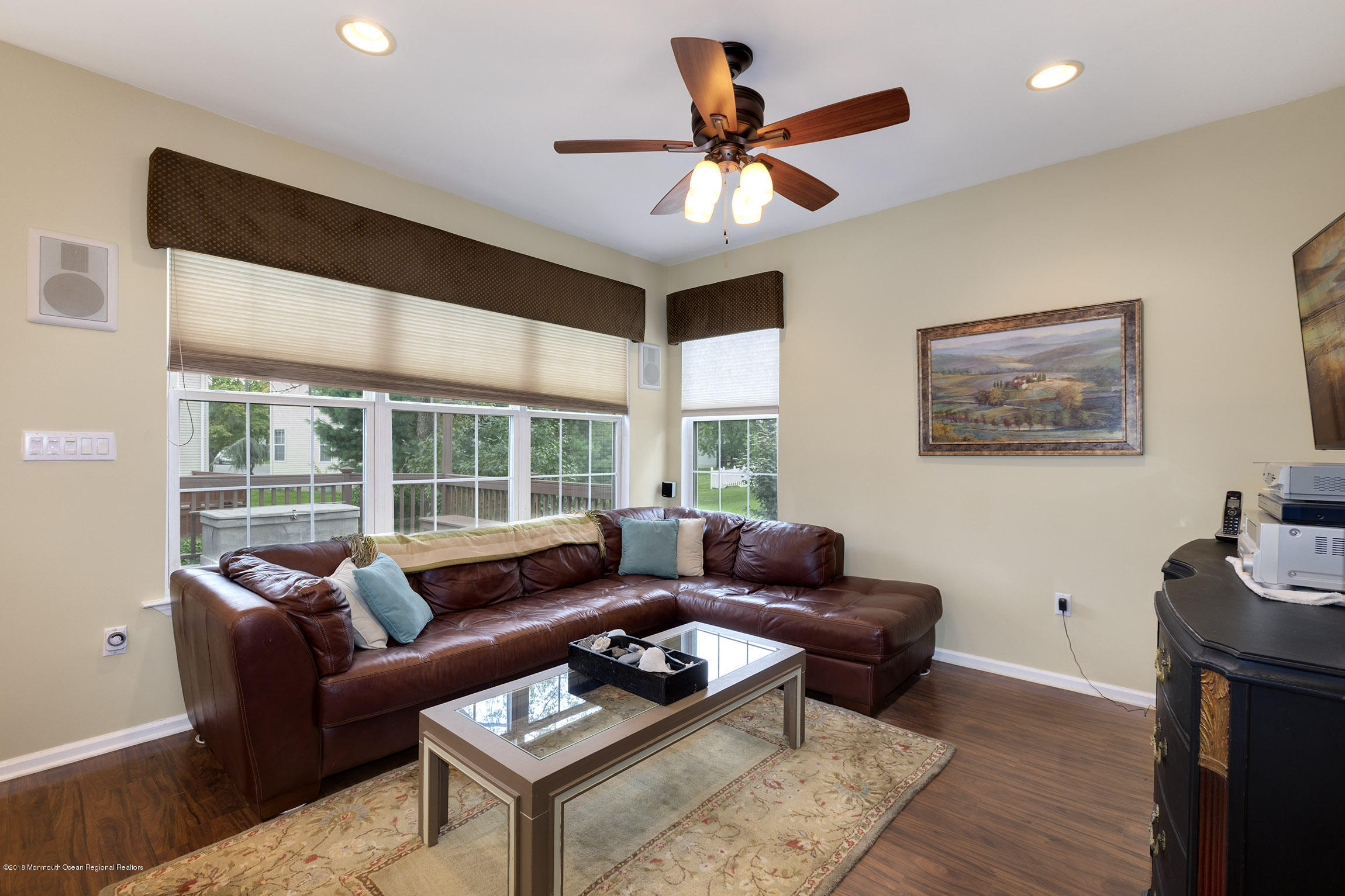 1 Lafayette Key Colts Neck, NJ 07722 - Photo 11 of 25 a living room with furniture and a large window