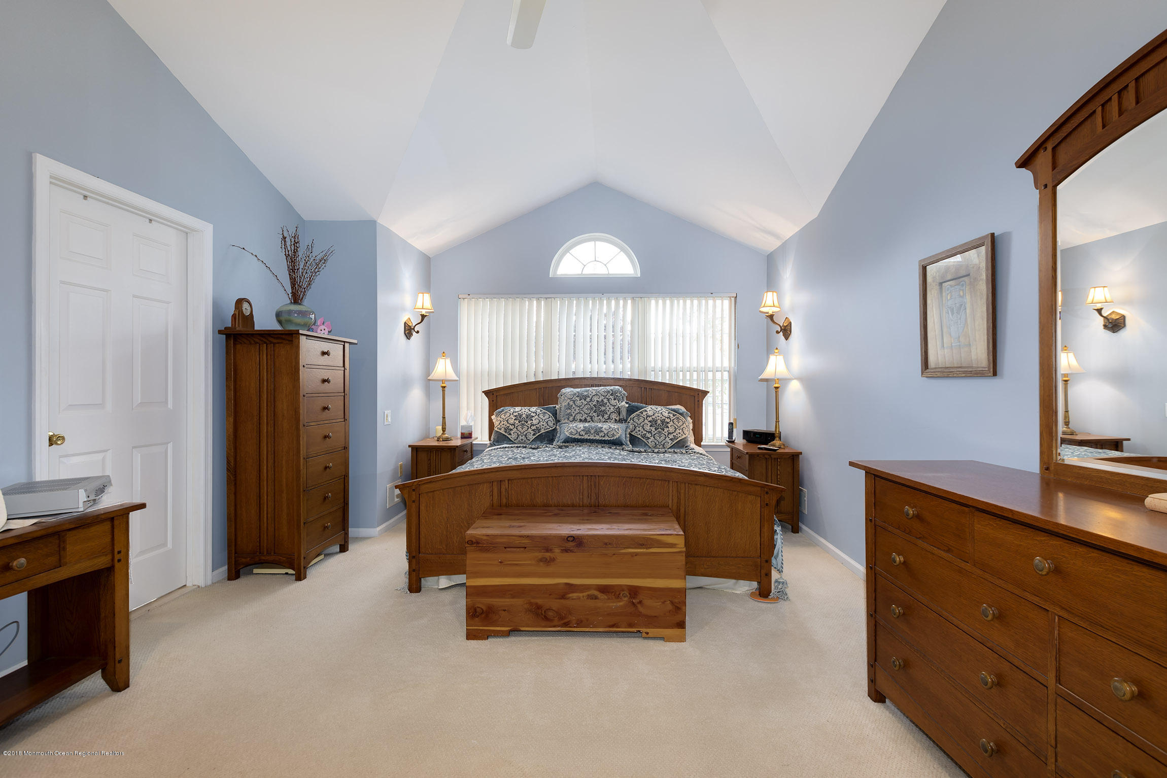 1 Lafayette Key Colts Neck, NJ 07722 - Photo 13 of 25 a spacious bedroom with a bed and a dresser in it