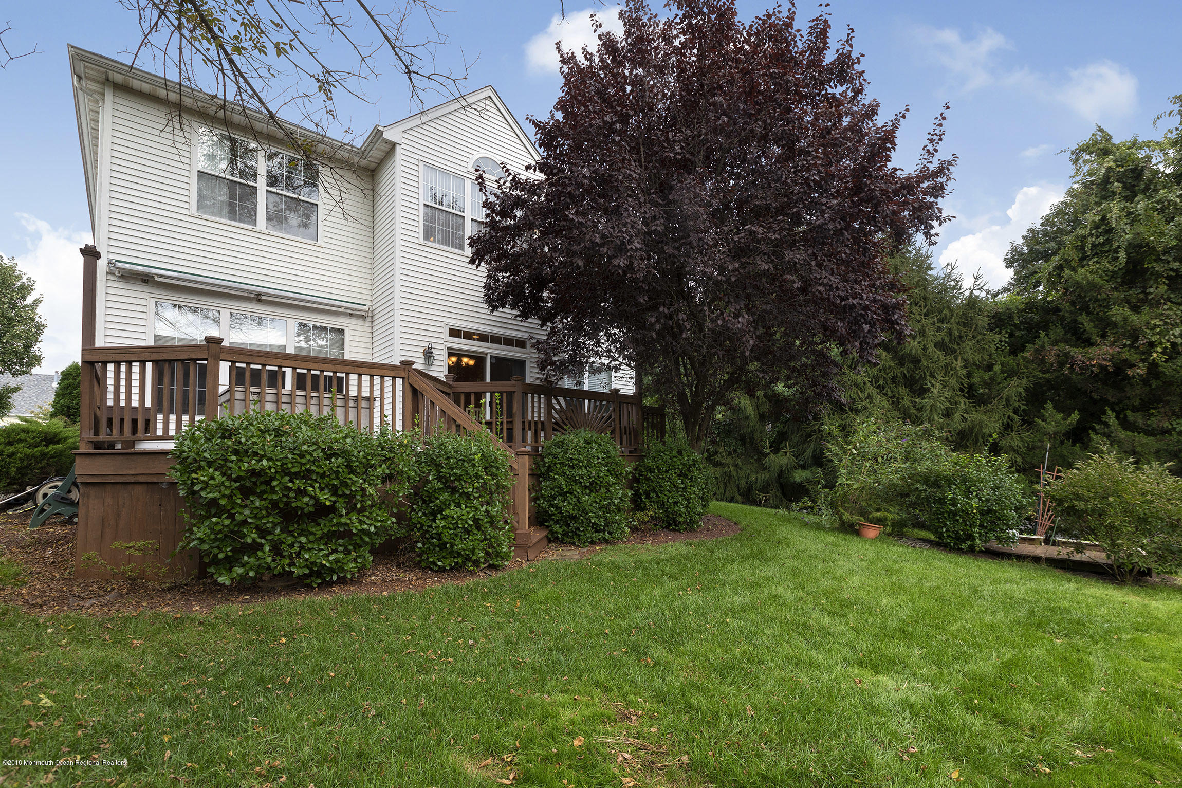 1 Lafayette Key Colts Neck, NJ 07722 - Photo 24 of 25 a front view of a house with a yard