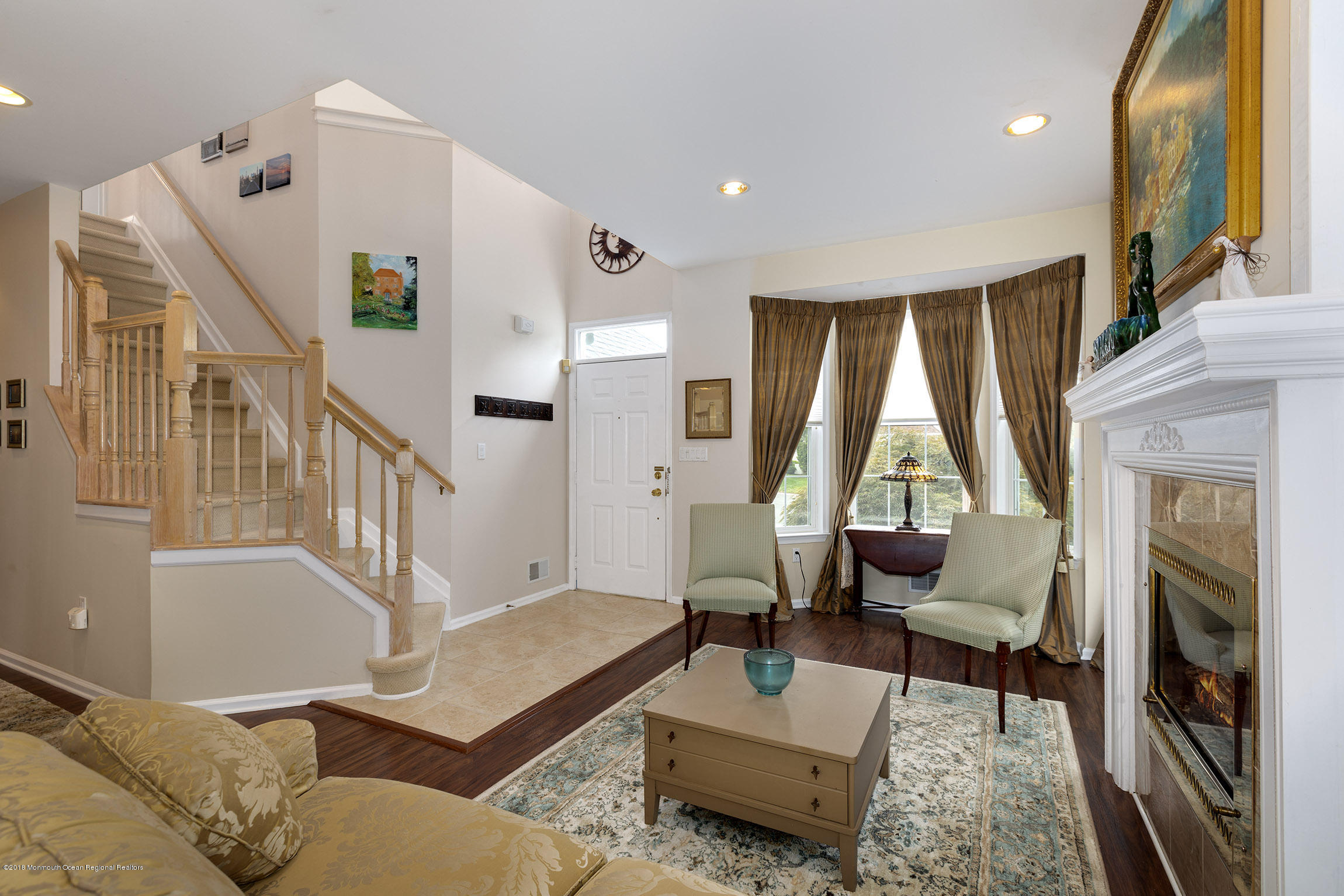 1 Lafayette Key Colts Neck, NJ 07722 - Photo 3 of 25 a living room with furniture and a fireplace