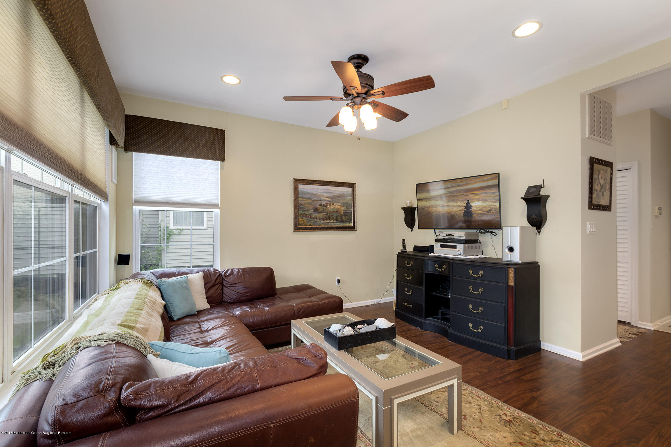 1 Lafayette Key Colts Neck, NJ 07722 - Photo 10 of 25 a living room with furniture and a flat screen tv