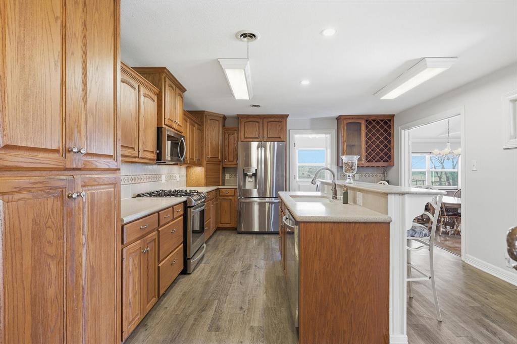 6996 Ganzer Road East Denton, TX 76207 - Photo 13 of 38 Kitchen looking towards laundry room