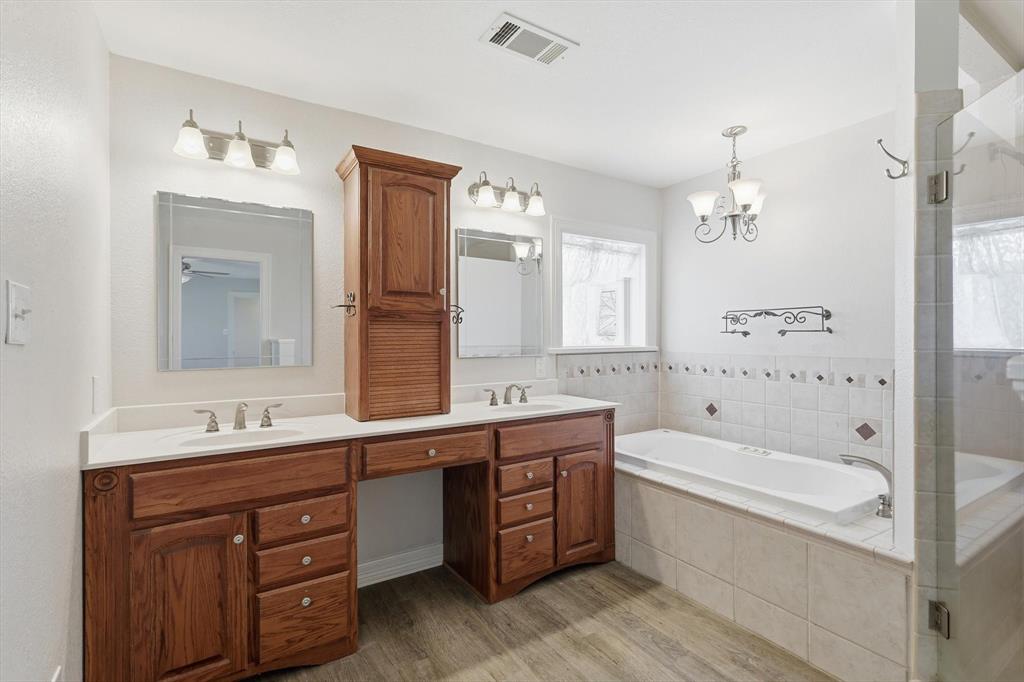 6996 Ganzer Road East Denton, TX 76207 - Photo 17 of 38 Primary bathroom with double vanity