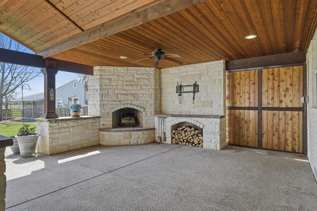 6996 Ganzer Road East Denton, TX 76207 - Photo 2 of 38 Cozy outdoor living center with kitchen