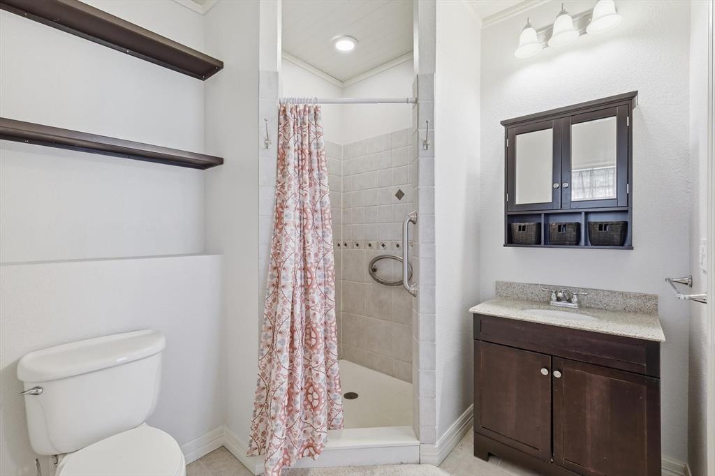 6996 Ganzer Road East Denton, TX 76207 - Photo 28 of 38 Apartment bathroom