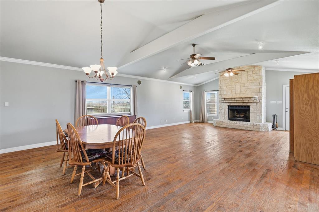 6996 Ganzer Road East Denton, TX 76207 - Photo 6 of 38 Great room with fireplace