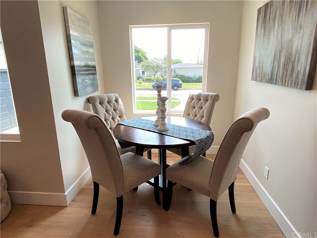 5035 Avenue B Torrance, CA 90505 - Photo 17 of 60 a dining room with furniture and wooden floor