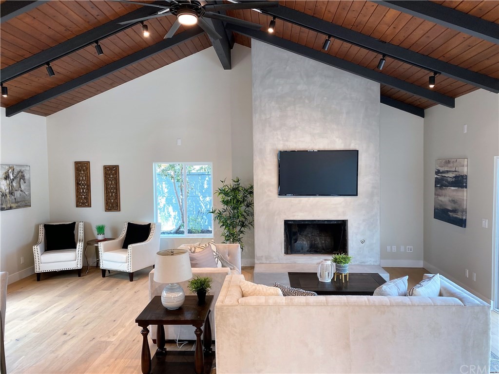 5035 Avenue B Torrance, CA 90505 - Photo 19 of 60 a living room with furniture and a fireplace