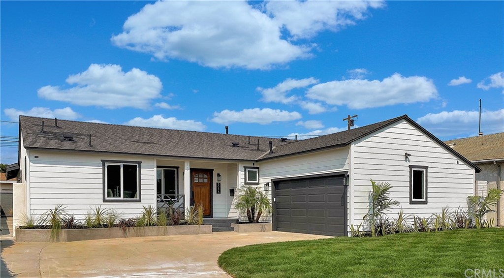 5035 Avenue B Torrance, CA 90505 - Photo 2 of 60 a front view of a house with a yard