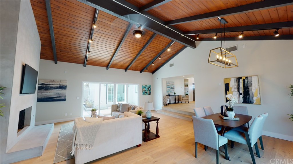 5035 Avenue B Torrance, CA 90505 - Photo 23 of 60 a living room with furniture and a table