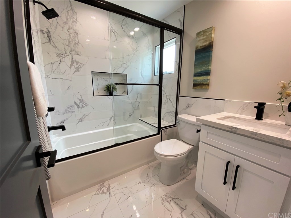 5035 Avenue B Torrance, CA 90505 - Photo 30 of 60 a bathroom with a sink toilet and shower