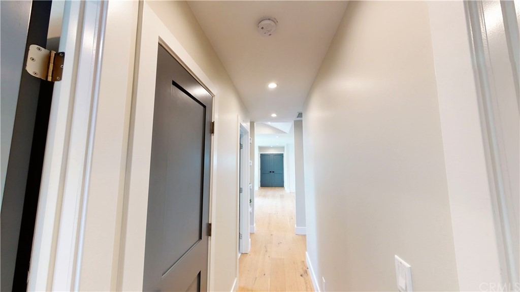 5035 Avenue B Torrance, CA 90505 - Photo 31 of 60 a view of a hallway with wooden floor