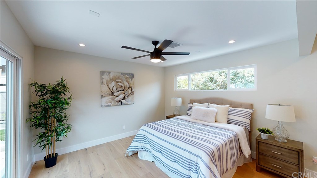 5035 Avenue B Torrance, CA 90505 - Photo 32 of 60 a bedroom with a bed and a potted plant