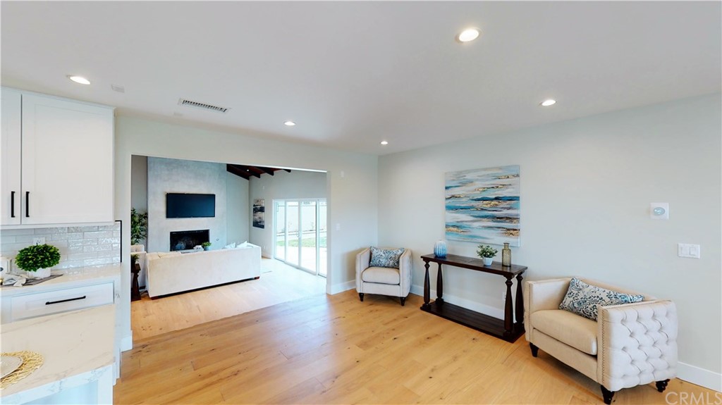 5035 Avenue B Torrance, CA 90505 - Photo 8 of 60 a living room with furniture and a flat screen tv