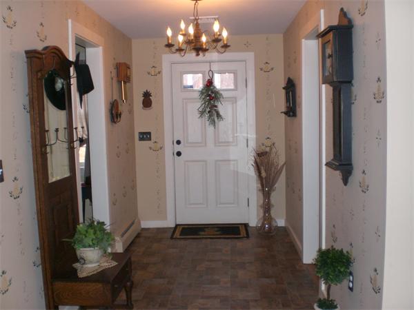 948 Cronin Road Warren, MA 01585 - Photo 13 of 25 a view of a bathroom with a shower and a mirror