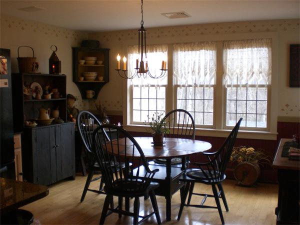 948 Cronin Road Warren, MA 01585 - Photo 17 of 25 a view of a dining room with furniture and window