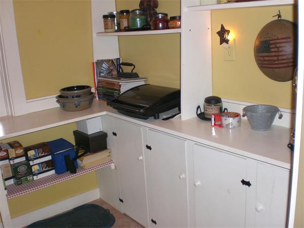 948 Cronin Road Warren, MA 01585 - Photo 19 of 25 a room with storage and utility