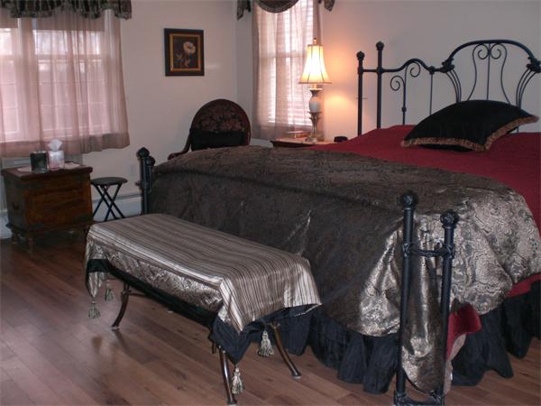 948 Cronin Road Warren, MA 01585 - Photo 22 of 25 a bedroom with furniture and a window