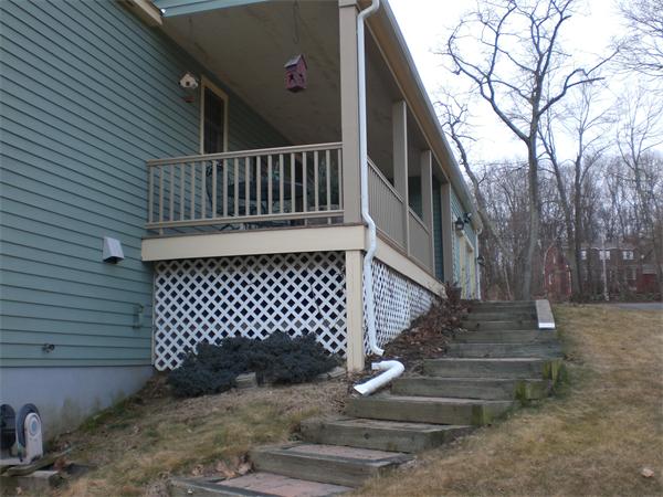 948 Cronin Road Warren, MA 01585 - Photo 6 of 25 a view of stairs and a yard