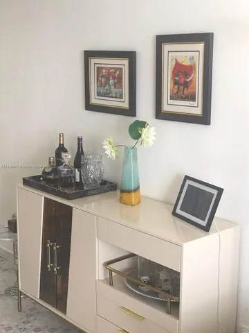 a bathroom with a sink and a microwave