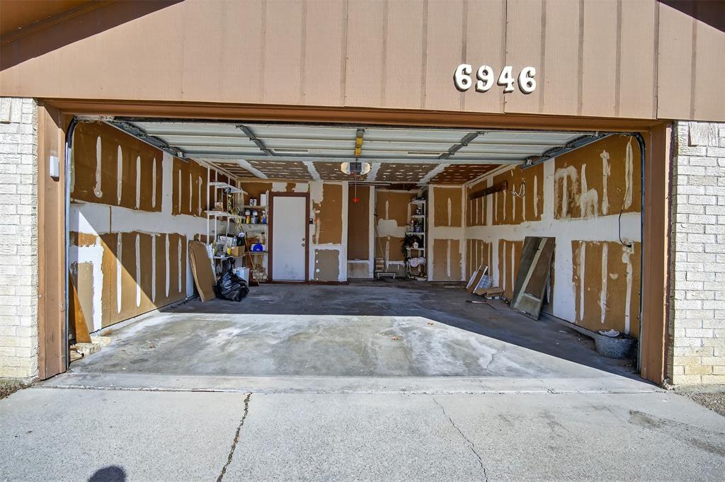 6946 Trailcrest Drive Dallas, TX 75232 - Photo 21 of 22 a view of entryway front of a house