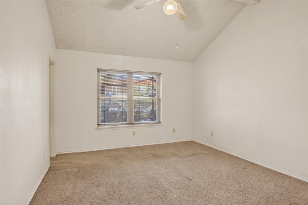 6946 Trailcrest Drive Dallas, TX 75232 - Photo 10 of 22 an empty room with a window