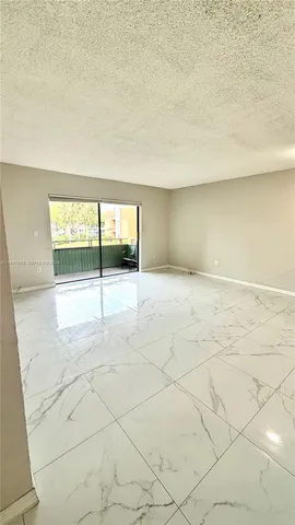 a view of swimming pool with a yard