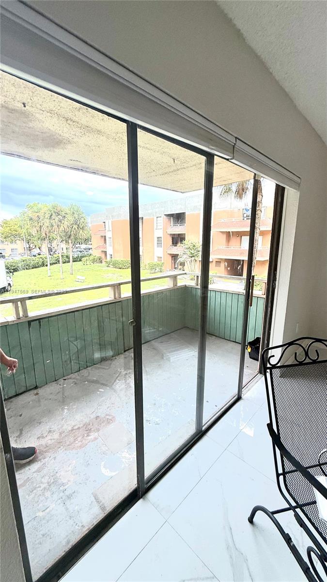 17600 Northwest 68th Avenue, Unit B2002 Hialeah, FL 33015 - Photo 7 of 38 a view of a floor to ceiling window with a sink