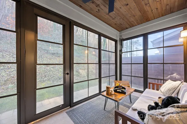 a blue bench sitting in front of a window