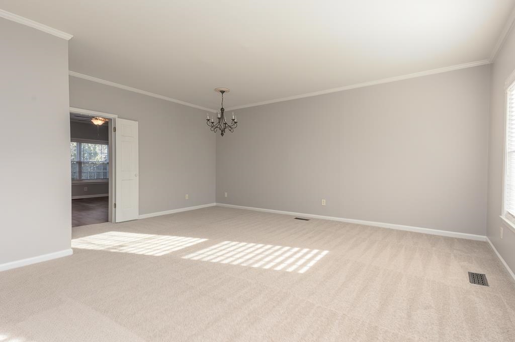 1806 Kimbrough Road Germantown, TN 38138 - Photo 13 of 26 an empty room with a empty space and windows