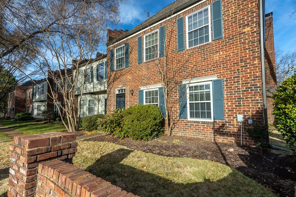 1806 Kimbrough Road Germantown, TN 38138 - Photo 2 of 26 a front view of a house with a yard