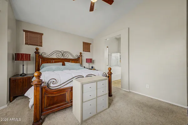 a bedroom with a bed and a closet