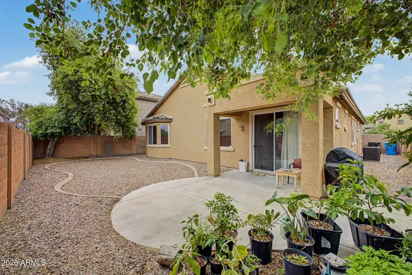 a house with trees in the background