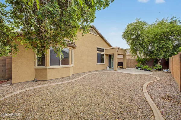 a house view with a backyard space