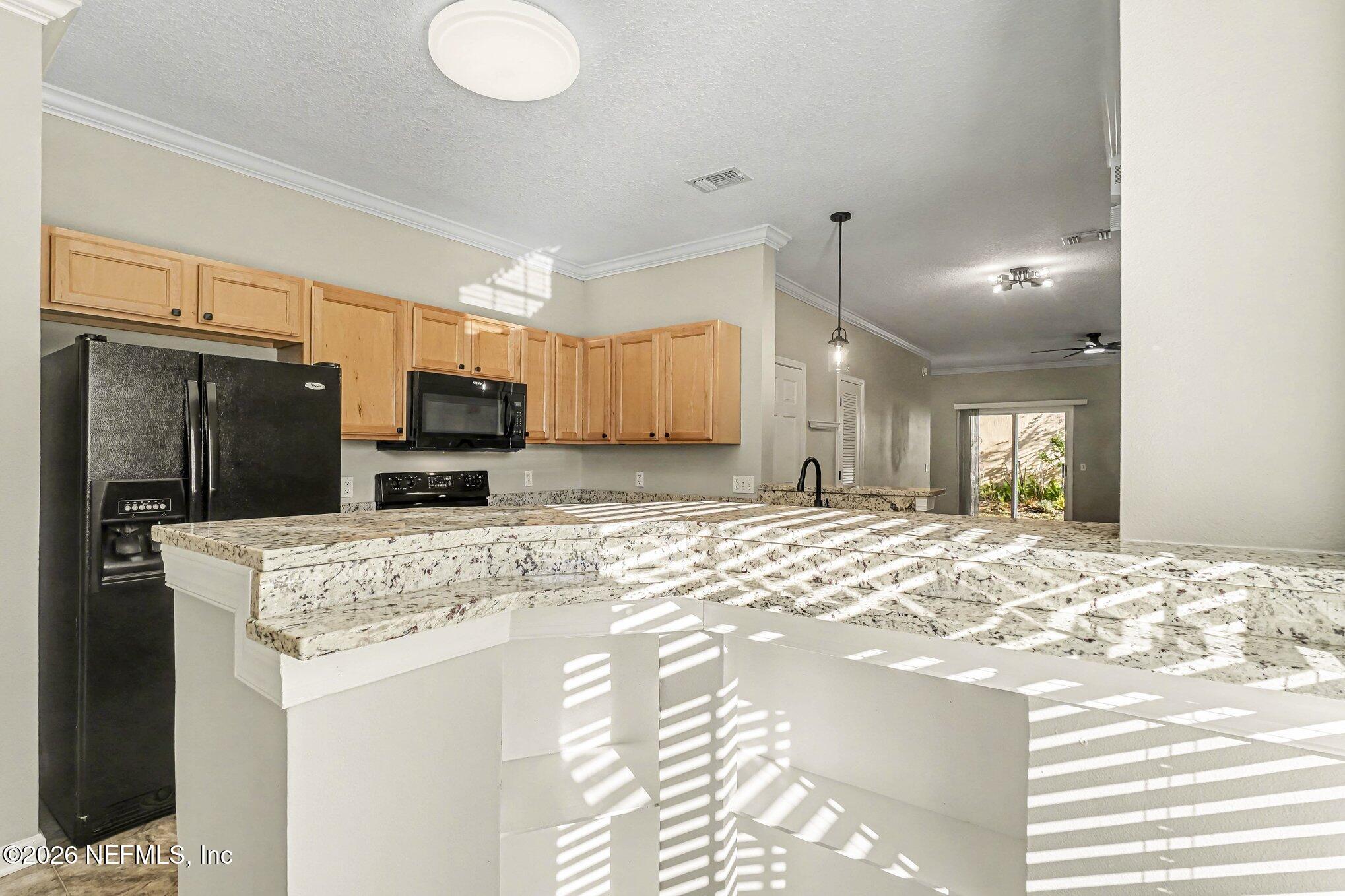 782 Scrub Jay Drive St. Augustine, FL 32092 - Photo 9 of 28 Bar storage