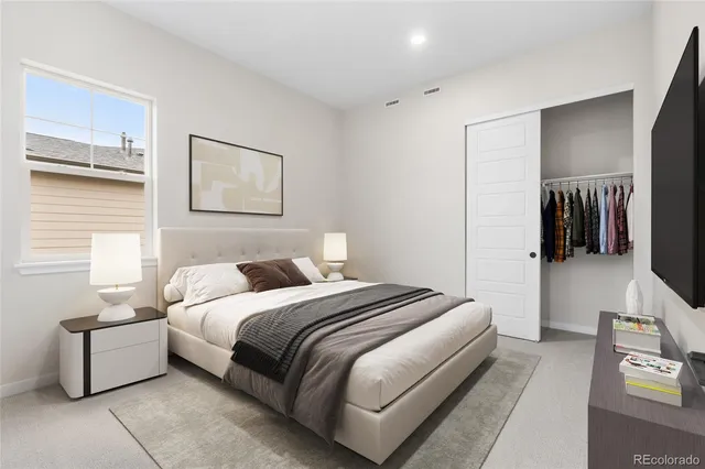 a bathroom with a sink toilet and a mirror