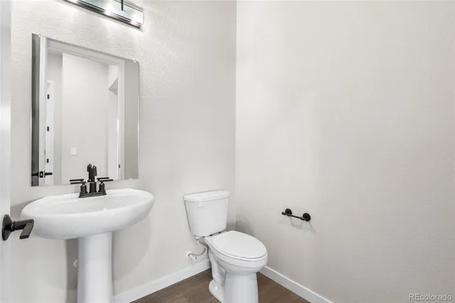 a view of a balcony with wooden floor