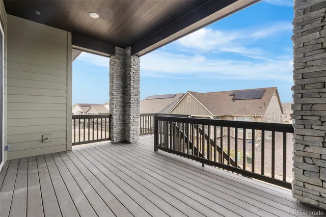 a view of a house with large windows
