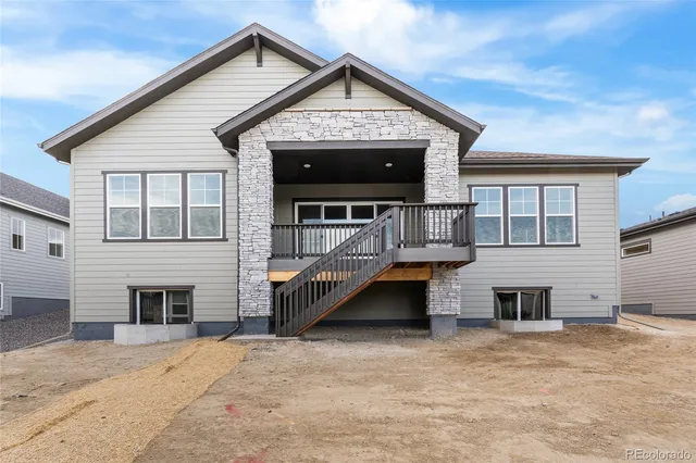 a view of a house with a snow in the yard