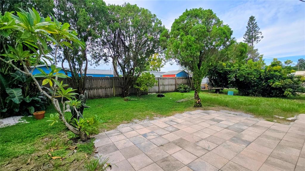 115 15th Avenue Southwest Largo, FL 33770 - Photo 11 of 13 a view of backyard with a garden and entertaining space