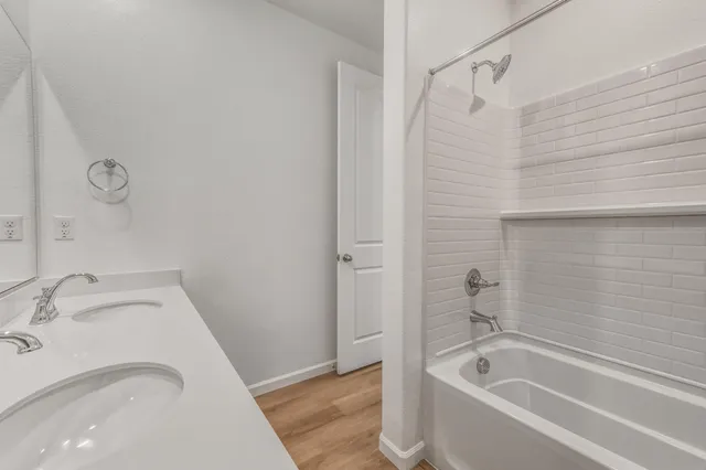 a bathroom with a sink and bathtub