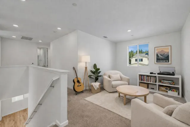 a living room with furniture and a couch