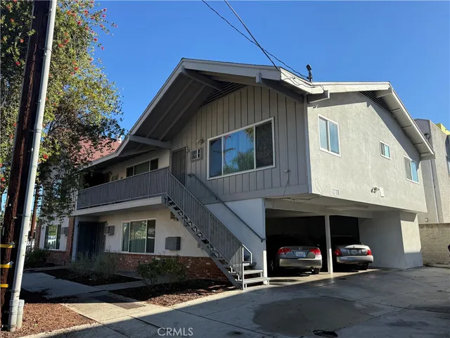 a car parked in front of a house