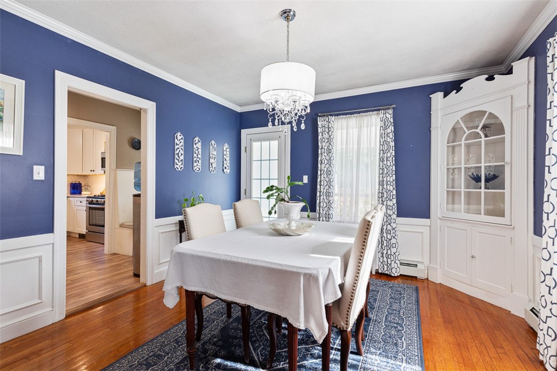 124 Meadow Road Woonsocket, RI 02895 - Photo 23 of 47 bold dining room with built in china cabinet and gorgeous wainscoting